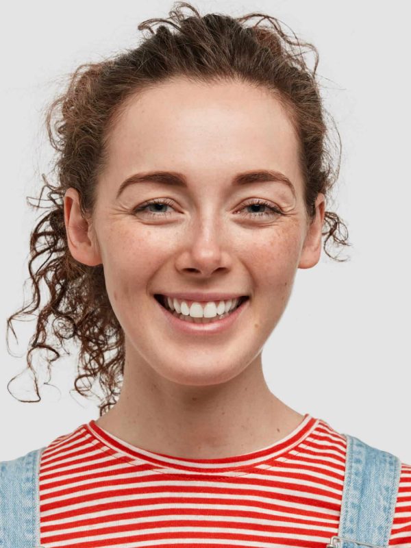 cheerful-curly-woman-with-pleased-expression-dres-2022-02-05-11-38-41-utc-1-1.jpg